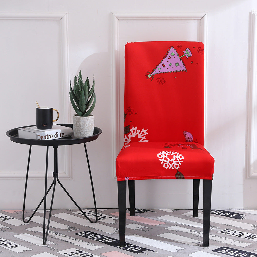 Festive Christmas chair with universal elastic cover featuring holiday designs.