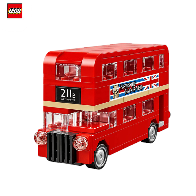 The image shows a LEGO Creator set featuring a Double Decker London Bus. The top part of the image displays the front view of the bus with the route number "211a" and the Union Jack flag. The bottom part shows a side view of the bus with a banner that reads "Now's the time to visit" alongside the Union Jack flag. The bus is predominantly red with realistic design details, making it an engaging and iconic toy for children.