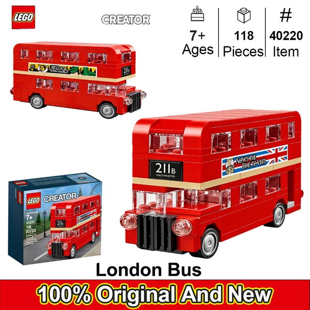 The image shows a LEGO Creator set featuring a Double Decker London Bus. The top part of the image displays the front view of the bus with the route number "211a" and the Union Jack flag. The bottom part shows a side view of the bus with a banner that reads "Now's the time to visit" alongside the Union Jack flag. The bus is predominantly red with realistic design details, making it an engaging and iconic toy for children.