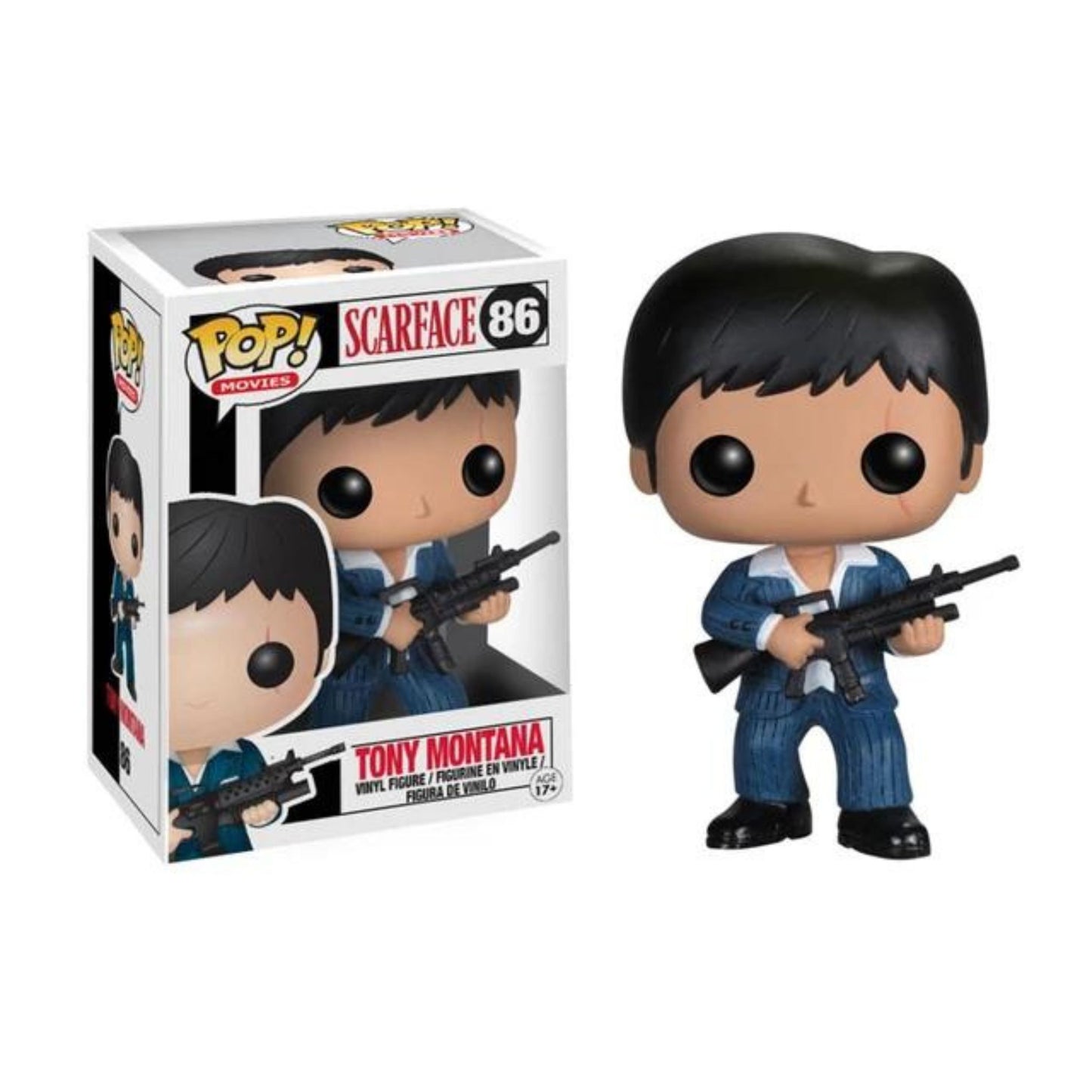 The image shows a Funko Pop! vinyl figure of Tony Montana from the movie "Scarface." The figure is dressed in a blue suit and is holding a rifle. The packaging is also visible, featuring the Pop! Movies logo, the name "Scarface," and the number 86. This collectible is part of the POP Movie Series and is designed for children aged 17 and up. The figure is highly detailed and captures the essence of the iconic character, making it an interesting and relevant item for collectors and fans of the movie.