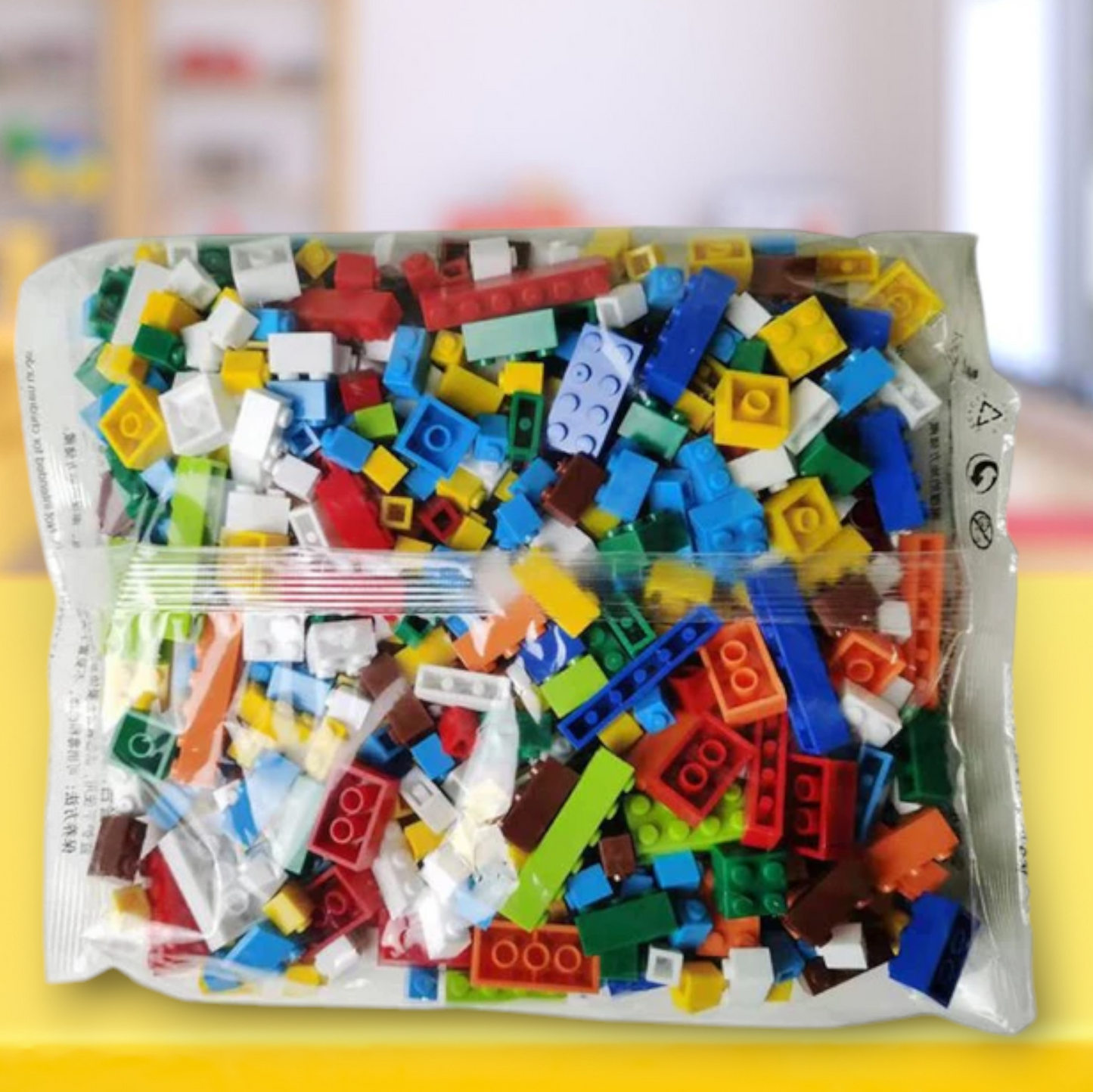 A vibrant collection of 1000 pieces of kids’ building blocks by Giggly Groves, featuring a variety of colors such as red, yellow, blue, green, and orange. The interlocking plastic bricks are scattered in a playful and inviting manner with the quantity ‘1000 pcs’ prominently displayed in the center. Ideal for creative play and motor skill development